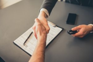 two people shaking hands