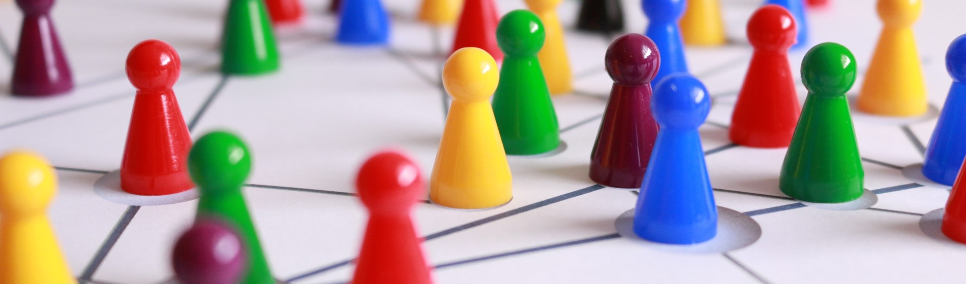 multiple coloured board game pieces. WIG EVENT DEC 22022